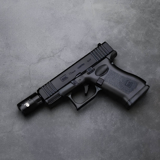 Glock 17 Pistol Lighter with laser sight and silencer side profile